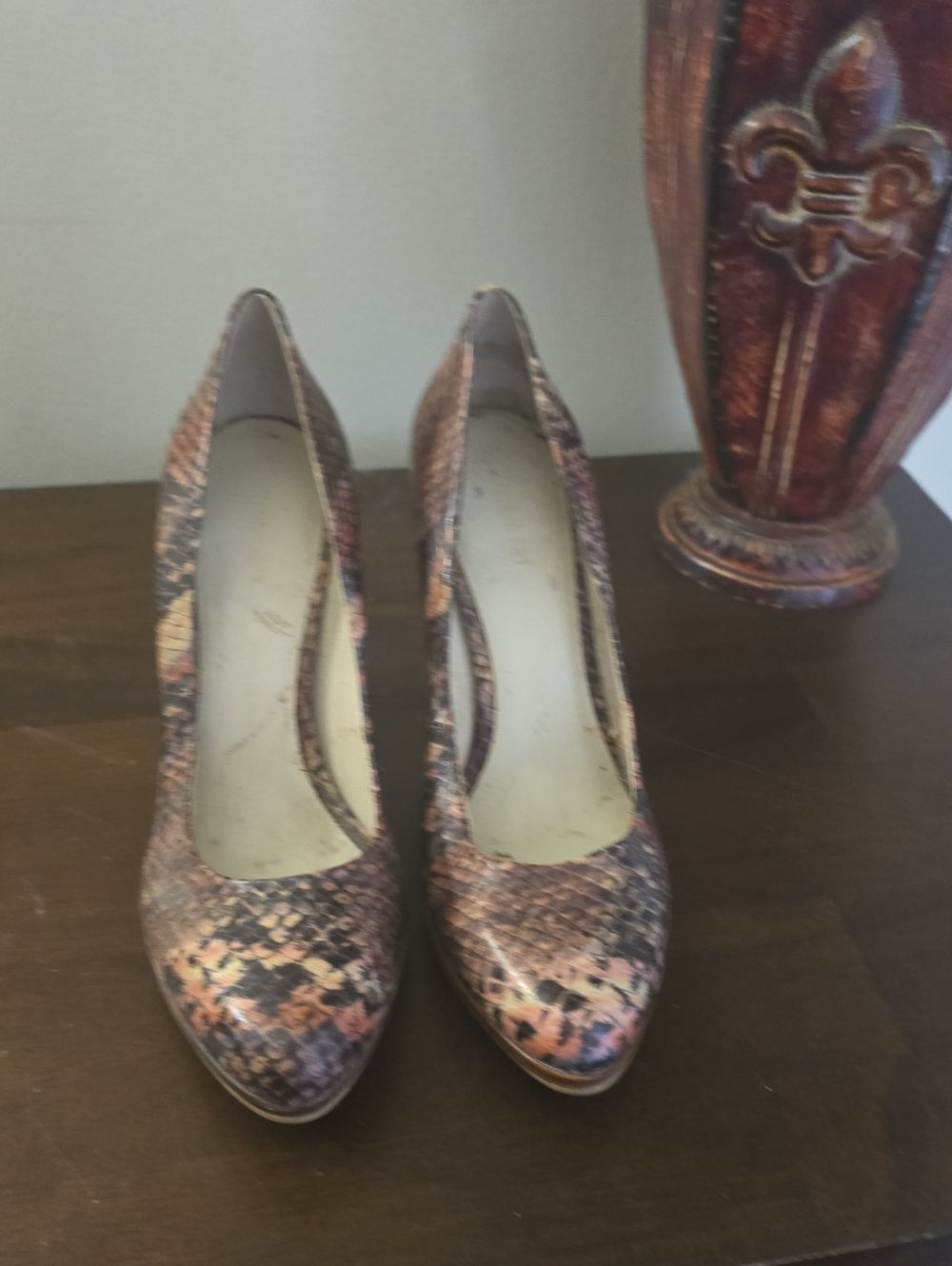 Nine West Metallic Copper and Black Snakeskin Pumps